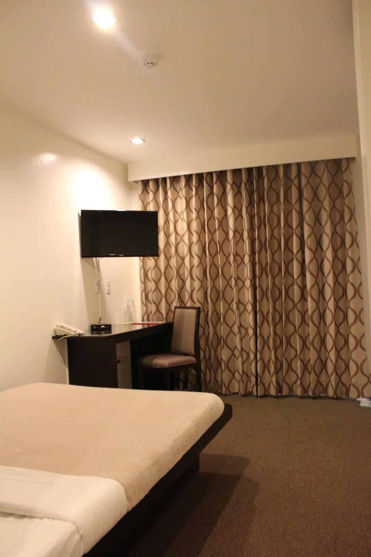 Be-Ing Suites Davao Екстер'єр фото