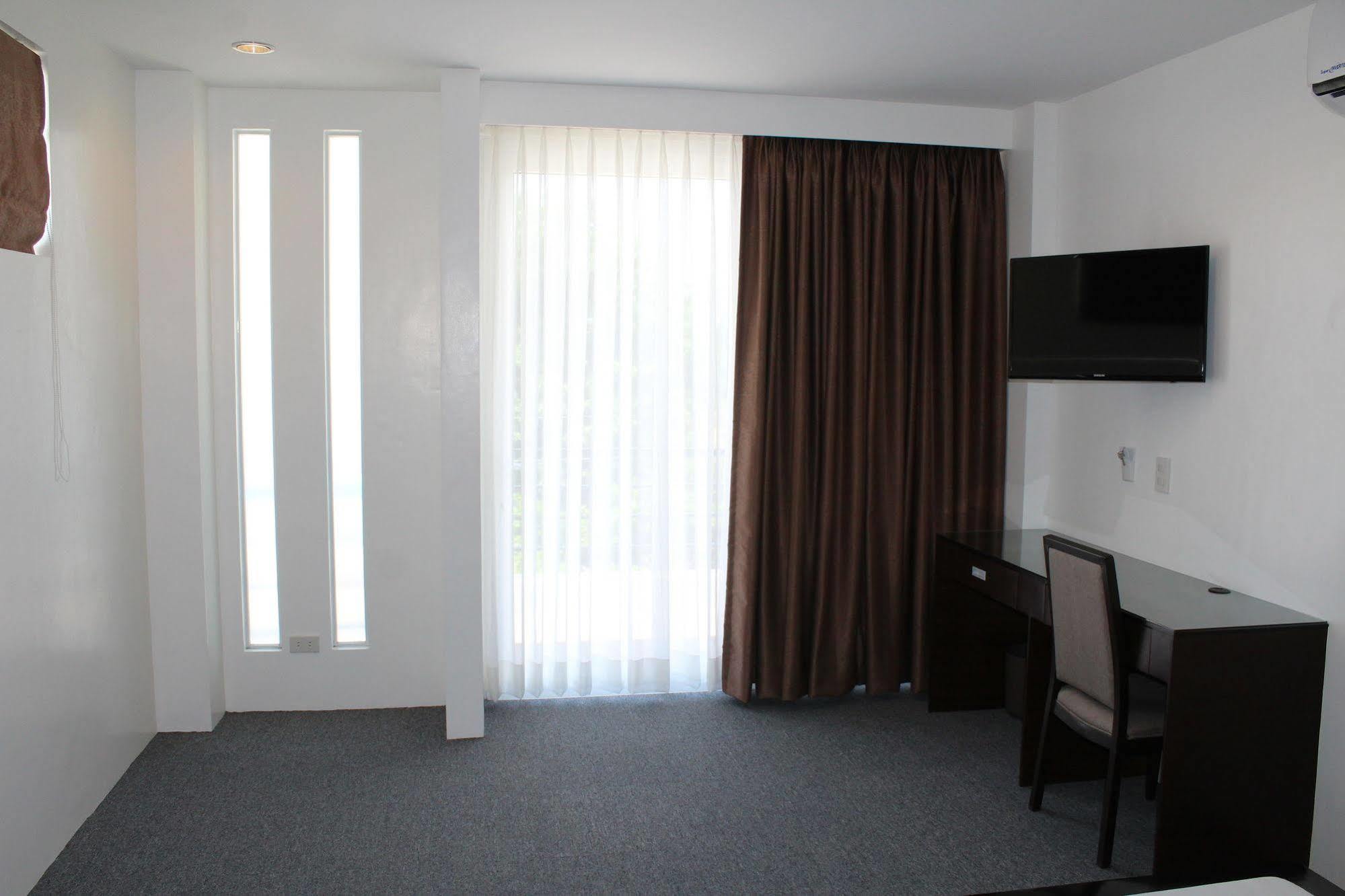 Be-Ing Suites Davao Екстер'єр фото